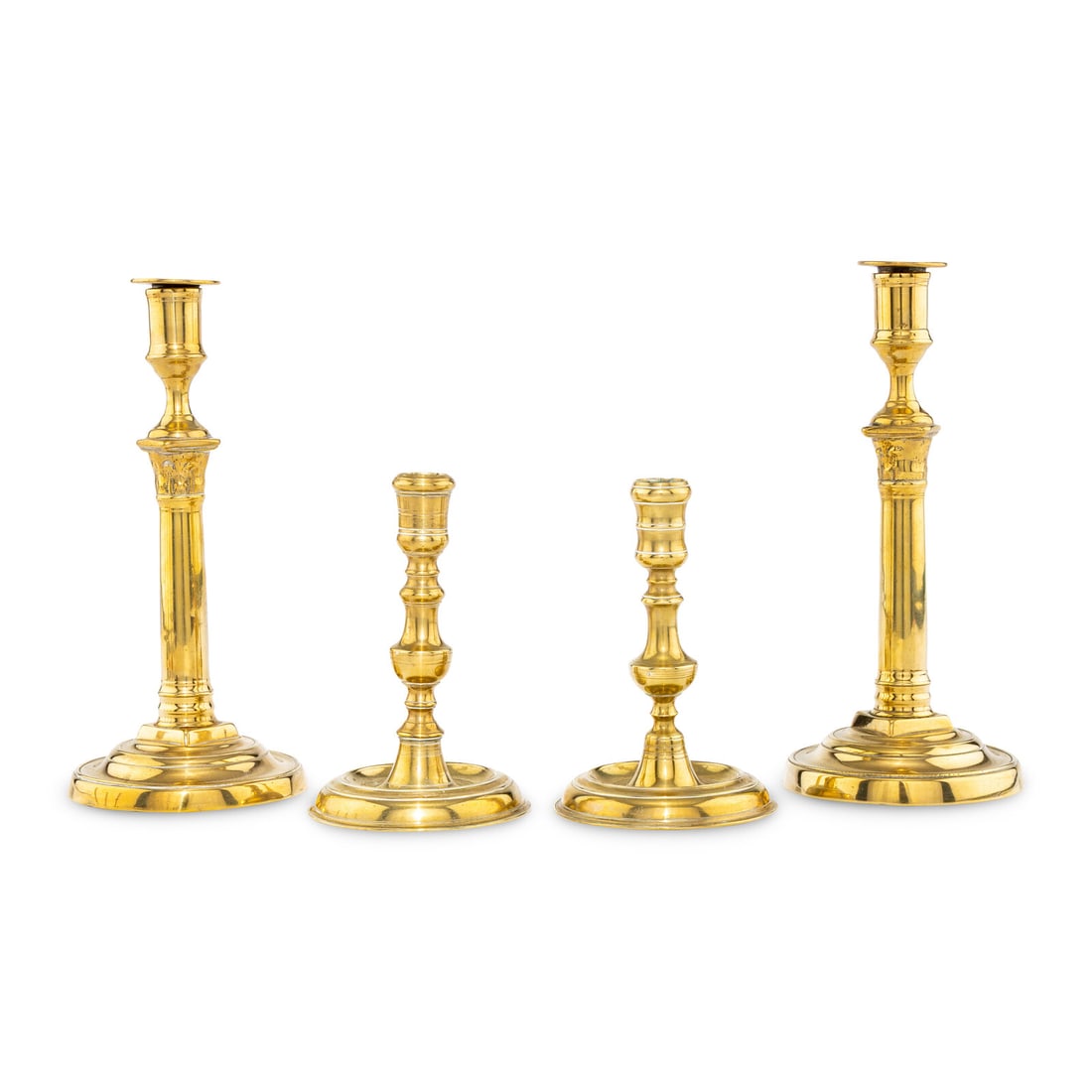 A Collection of Two Pairs of Brass Candlesticks (1 of 2)