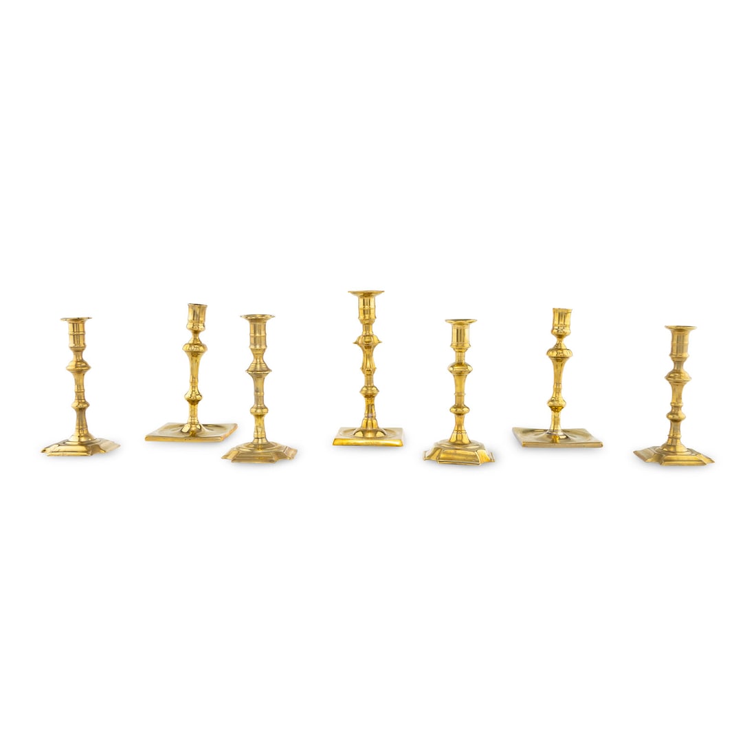A Group of Seven Brass Candlesticks (1 of 2)