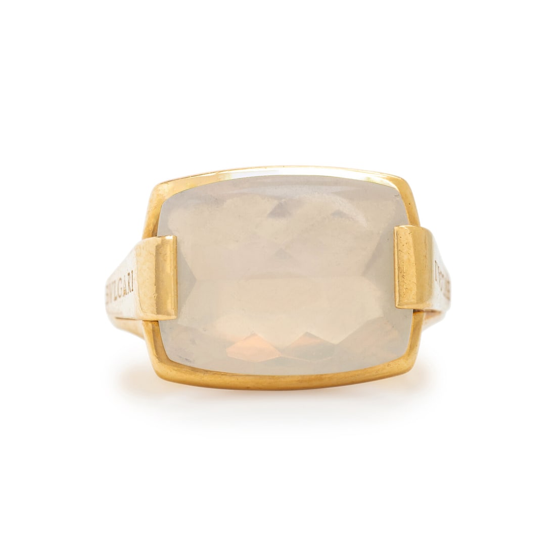 Bulgari, Yellow Gold and Moonstone 'Metropolis' Ring: Bulgari, Yellow Gold and Moonstone 'Metropolis' Ring Buff top moonstone measuring approximately 15.95 x 12.65 x 6.15 mm. 18 karat yellow gold. Ring size 6 3/4. Stamp: BULGARI 750 MADE ITALY (Italian m