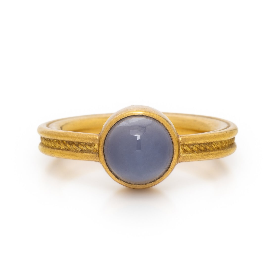 High Karat Yellow Gold and Moonstone Ring: High Karat Yellow Gold and Moonstone Ring Round cabochon blue moonstone measuring approximately 7.45 x 7.45 mm. 20 karat yellow gold. Ring size 6 3/4. Engraving: M.M. 20K. Gross weight: 5.15 dwt.