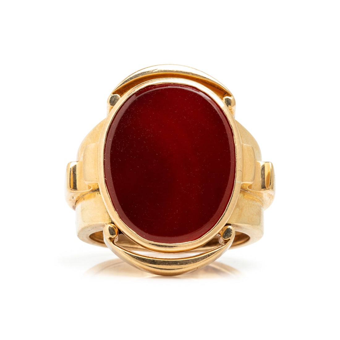 Yellow Gold and Carnelian Ring: Yellow Gold and Carnelian Ring Carnelian measuring approximately 19.85 x 15.25 x 2.15 mm. 18 karat yellow gold. Ring size 8. Stamp: 18 CT. Gross weight: 9.25 dwt. From a Private Collection, Prescott, 