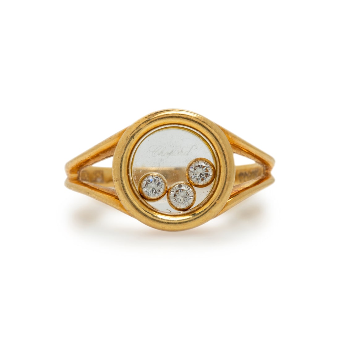 Chopard, Yellow Gold and Diamond 'Happy Diamonds Icons' Ring: Chopard, Yellow Gold and Diamond 'Happy Diamonds Icons' Ring Round diamonds. 18 karat yellow gold. Ring size 6 1/4. Stamp: SWISS CHOPARD LUC 750. Gross weight: 3.10 dwt. Accompanied by a Chopard box. 