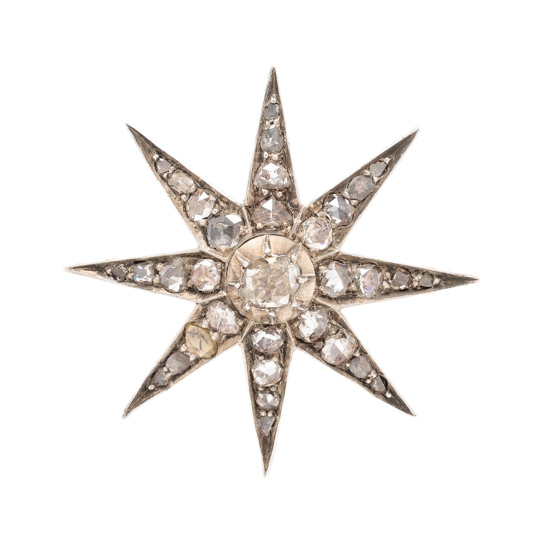 Early Victorian, Diamond and Silver-Topped Low Karat Gold Starburst Brooch: Early Victorian, Diamond and Silver-Topped Low Karat Gold Starburst Brooch Rose cut diamonds. Silver-topped low karat gold. 1 1/2 x 1 1/2 inches. Gross weight: 6.25 dwt. From the Estate of a Pennsylva