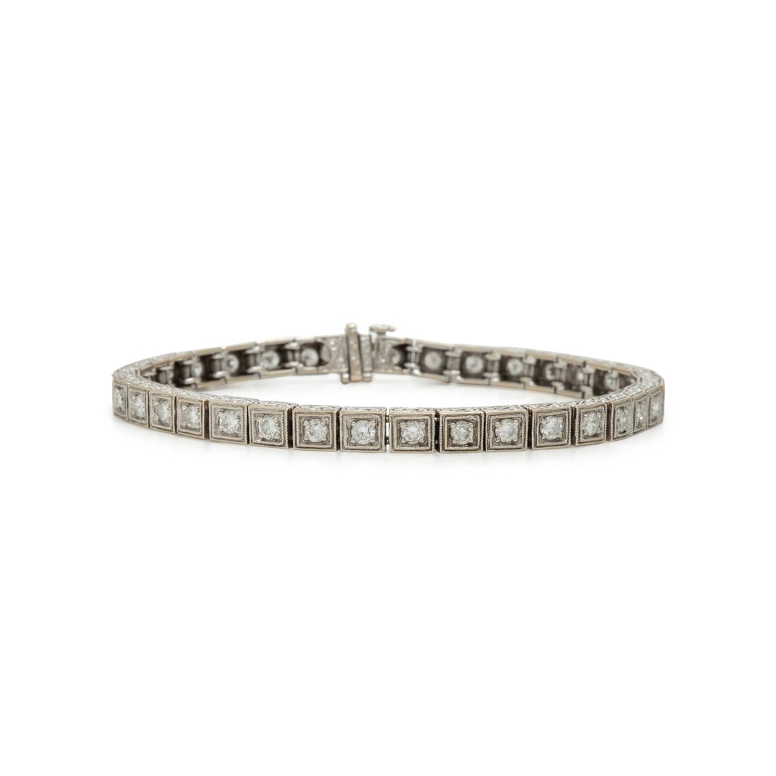 Diamond and White Gold Line Bracelet: Diamond and White Gold Line Bracelet Round diamonds weighing approximately 2.55 carats total. 18 karat white gold. 6 3/4 inches long. Stamp: 18K. Gross weight: 12.20 dwt. From the Estate of a