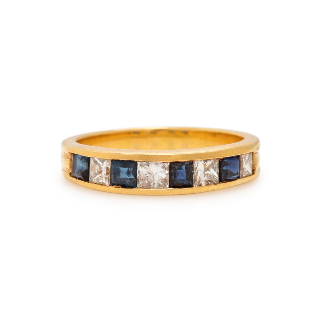 Yellow Gold, Diamond, and Sapphire Ring: Yellow Gold, Diamond, and Sapphire Ring Princess cut diamonds weighing approximately 0.40 carat total and princess cut sapphires. 18 karat yellow gold. Ring size 6. Stamp: 750. Gross weight: 2.45