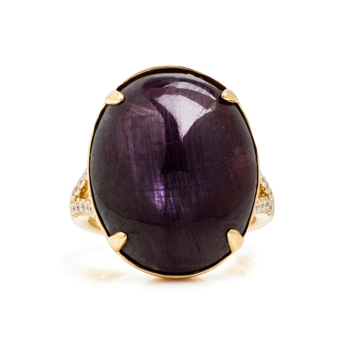 Star Ruby, Diamond, and Yellow Gold Ring: Star Ruby, Diamond, and Yellow Gold Ring Oval cabochon star ruby weighing approximately 37.60 carats total and round diamonds. 14 karat yellow gold. Ring size 7. Stamp: 14K CT 37.60. Gross weight: