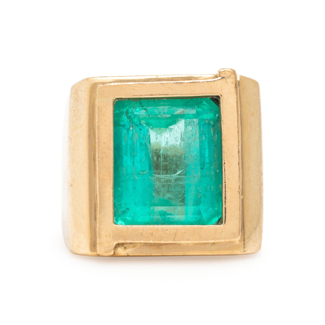 Emerald and Yellow Gold Ring: Emerald and Yellow Gold Ring Emerald cut emerald weighing approximately 14.10 carats by formula. Yellow gold. Ring size 10 1/4. Gross weight: 24.30 dwt. From a Private Collection, Prescott, Arizona Th