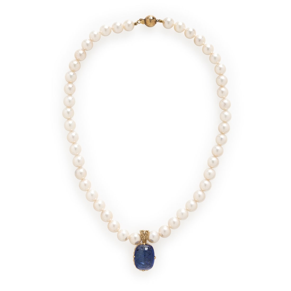 Cultured Pearl and Tanzanite Necklace: Cultured Pearl and Tanzanite Necklace Cultured pearls measuring approximately 8.50 - 8.95 mm, with cushion cut cabochon tanzanite drop weighing approximately 24.70 carats. 14 karat yellow gold and