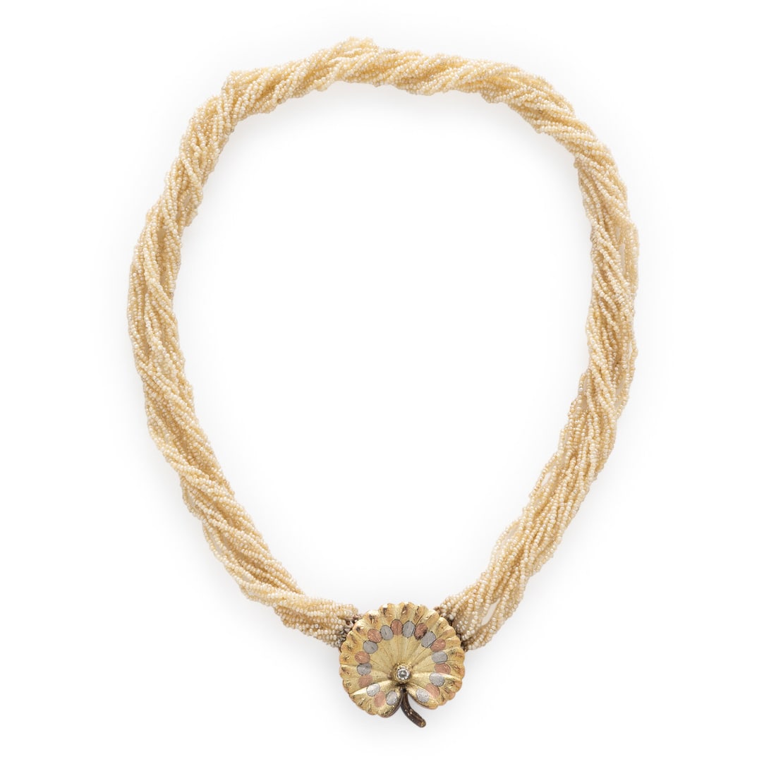 Seed Pearl Torsade Necklace: Seed Pearl Torsade Necklace 16 strands of seed pearls and a round diamond. 14 karat yellow, white, and rose gold. 16 1/2 inches long. Stamp: 14K. Gross weight: 16.05 dwt. This lot is located in Chicag