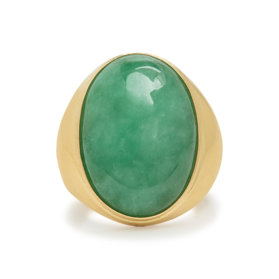 Yellow Gold and Jade Ring: Yellow Gold and Jade Ring Oval cabochon jade measuring approximately 24.50 x 18.10 x 7.40 mm. 14 karat yellow gold. Ring size 13. Stamp: 14K 585. Gross weight: 9.30 dwt. From a Private Collection,