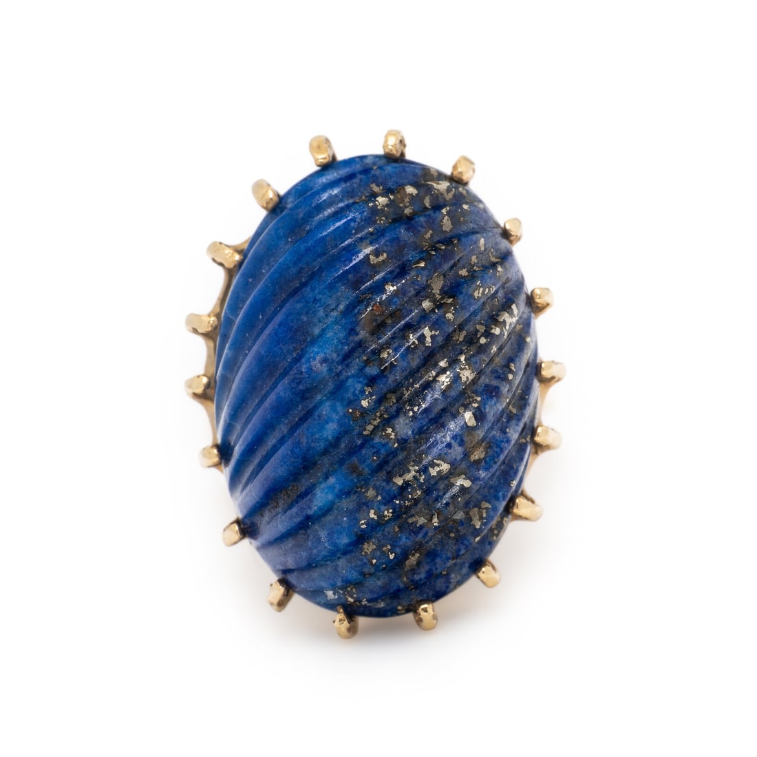 Lapis Lazuli and Yellow Gold Ring: Lapis Lazuli and Yellow Gold Ring Oval carved lapis lazuli measuring approximately 24.05 x 16.90 x 18.20 mm. Yellow gold. Ring size 5 1/2. Gross weight: 6.85 dwt. This lot is located in Chicago.