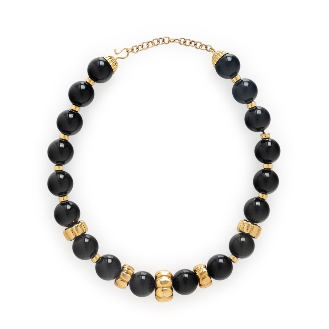 Onyx Bead and Yellow Gold Necklace: Onyx Bead and Yellow Gold Necklace Onyx beads measuring approximately 16.00 - 16.50 mm. Yellow gold. 17 1/2 inches long. Gross weight: 81.25 dwt. Estate of a Chicago Collector This lot is located in