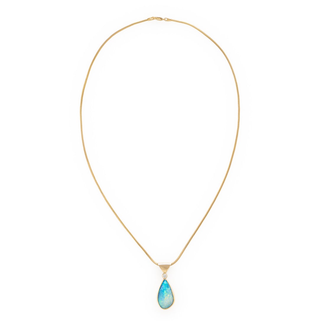 Peggie Robinson Designs, Opal Doublet, Diamond, and Yellow Gold Necklace: Peggie Robinson Designs, Opal Doublet, Diamond, and Yellow Gold Necklace Pear shape opal doublet measuring approximately 22.25 x 12.15 mm and a round diamond. 14 karat yellow gold. 19 7/8 inches long
