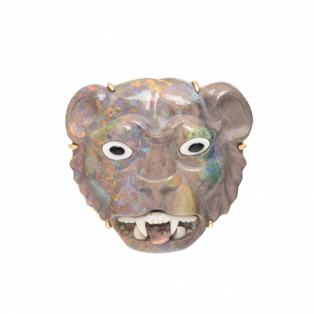 Opal Lion Pendant Brooch: Opal Lion Pendant Brooch Carved opal matrix lion's head and hardstone features. 14 karat yellow gold. 1 5/8 x 1 1/2 inches. Stamp: 14K. Gross weight: 11.15 dwt. This lot is located in Chicago.