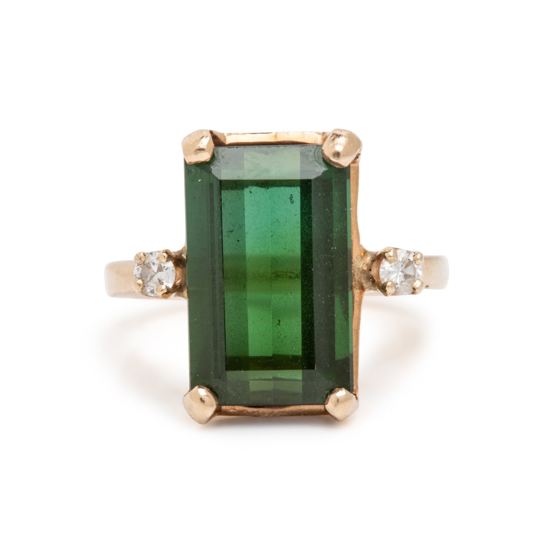 Green Tourmaline and Diamond Ring: Green Tourmaline and Diamond Ring Emerald cut green tourmaline weighing approximately 4.45 carats total, and round diamonds. Yellow gold. Ring size 4 1/4. Gross weight: 3.30 dwt. This lot is located i