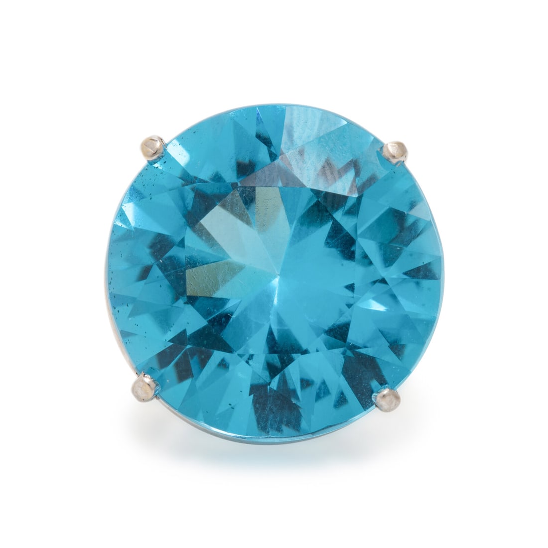 Blue Topaz and White Gold Ring: Blue Topaz and White Gold Ring Round blue topaz weighing approximately 35.90 carats by formula. 14 karat white gold. Ring size 6 3/4. Stamp: 14K (partially obscured maker's mark). Gross weight: 8.80 d