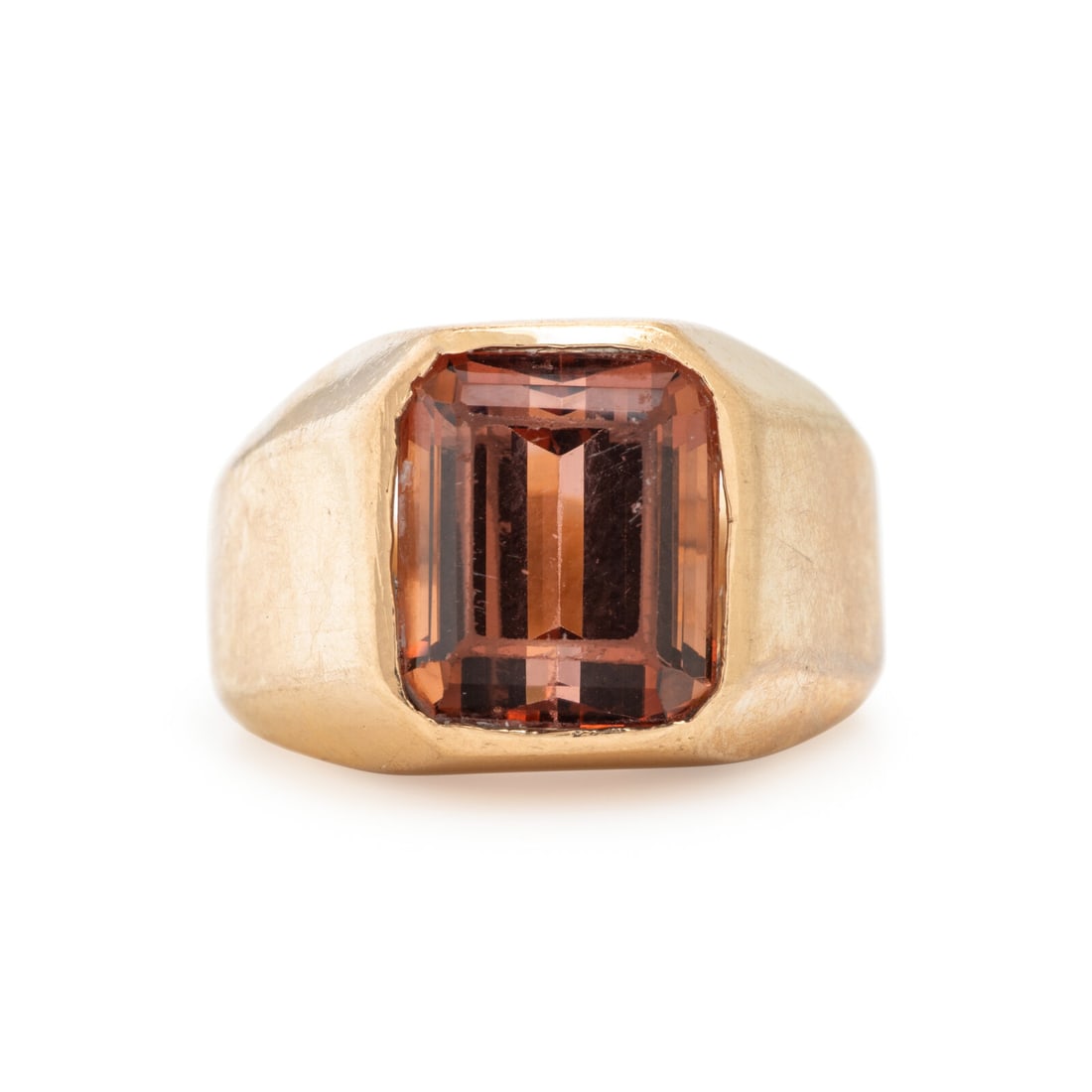Pink Tourmaline and Yellow Gold Ring: Pink Tourmaline and Yellow Gold Ring Emerald cut pink tourmaline weighing approximately 7.00 carats by formula. 14 karat yellow gold. Ring size 8. Stamp: 14K. Gross weight: 12.25 dwt. From a Private C