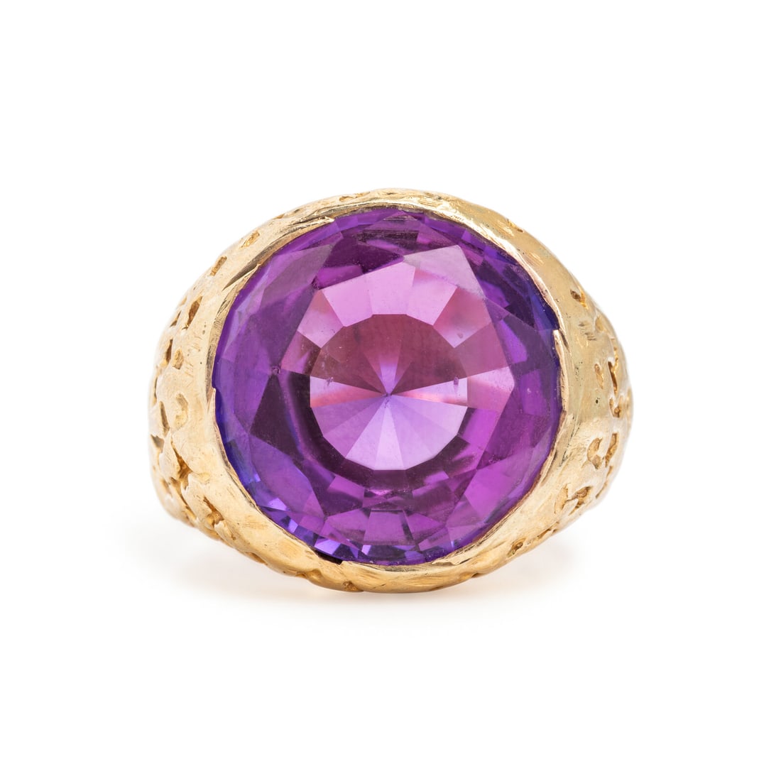 Yellow Gold and Synthetic Color Change Sapphire Ring: Yellow Gold and Synthetic Color Change Sapphire Ring Round synthetic color change sapphire weighing approximately 16.70 carats by formula. 14 karat yellow gold. Ring size 9 3/4. Stamp: 14K. Gross weig