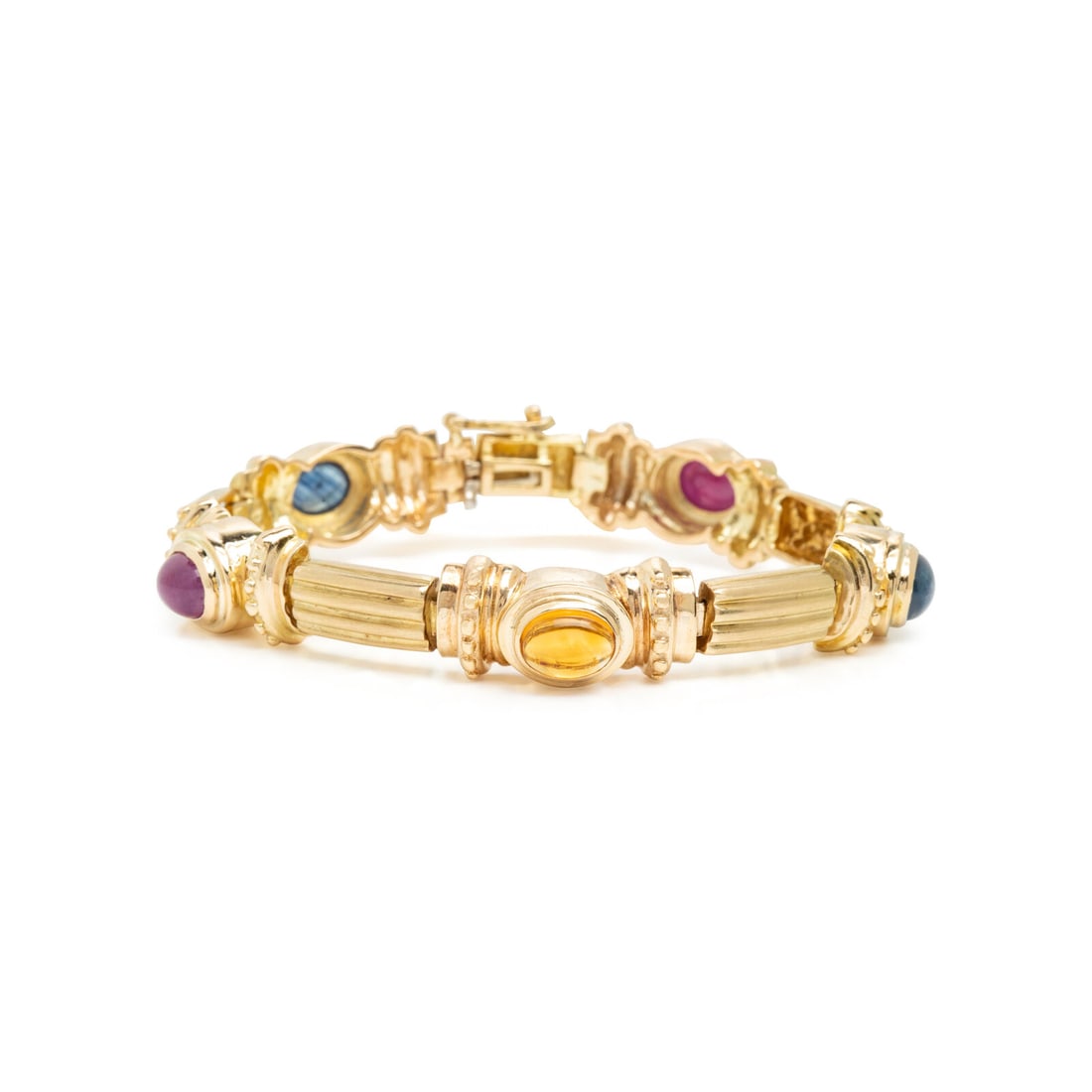 Yellow Gold and Multigem Bracelet: Yellow Gold and Multigem Bracelet Oval cabochon rubies, sapphires, and citrines. 14 karat yellow gold. 7 inches long. Stamp: 14K. Gross weight: 22.45 dwt. This lot is located in Chicago.