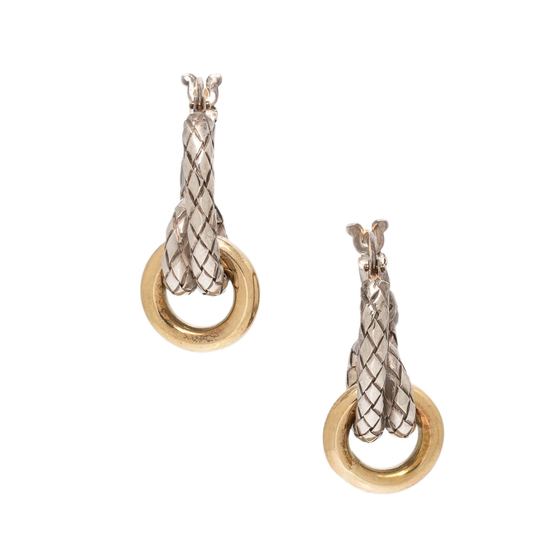 Sterling Silver and Yellow Gold Huggie Hoop Knot Earrings: Sterling Silver and Yellow Gold Huggie Hoop Knot Earrings Sterling silver and 18 karat yellow gold. 7/8 inch long. Stamp: 925 Alisa 750 ITALY. Gross weight: 5.65 dwt. The Property of an Evanston Lady 