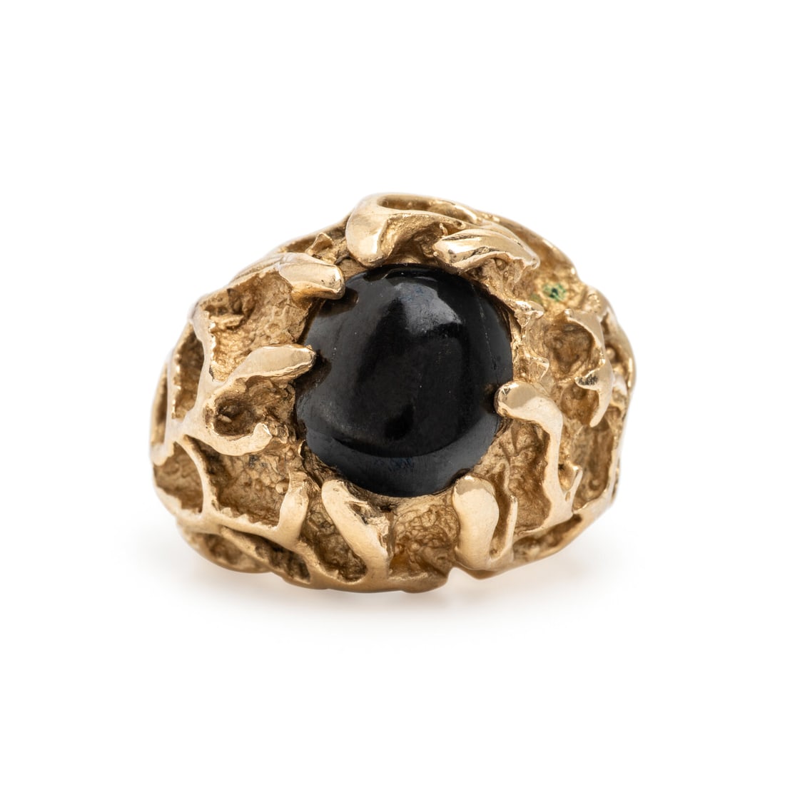 Yellow Gold and Star Diopside Ring: Yellow Gold and Star Diopside Ring Oval cabochon black star diopside weighing approximately 4.35 carats total by formula. Yellow gold. Ring size 7 1/4. Gross weight: 13.95 dwt. From a Private