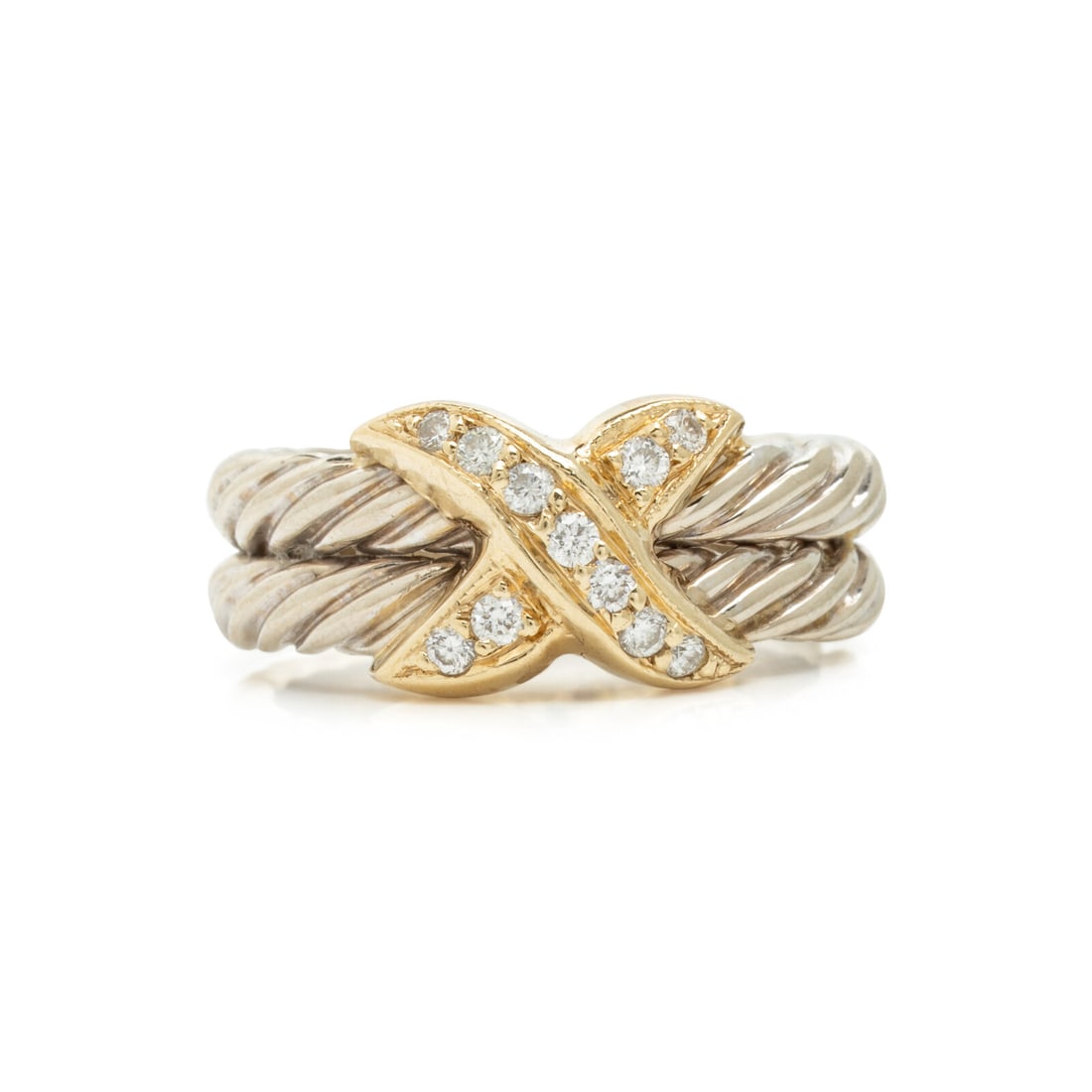 Bicolor Gold and Diamond Ring: Bicolor Gold and Diamond Ring Round diamonds weighing approximately 0.20 carat total. 14 karat yellow and white gold. Ring size 6 3/4. Stamp: 14K. Gross weight: 5.55 dwt. The Property of an Evanston