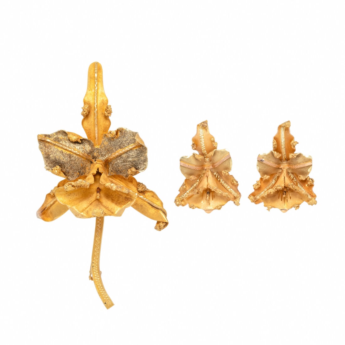 Bicolor Gold Orchid Earrings and Brooch: Bicolor Gold Orchid Earrings and Brooch 18 karat yellow and rose gold. Brooch: 2 3/4 x1 5/8 inches. Earrings: 1 inch long. Brooch stamp: (partially obscured) 18KN. Earrings stamp: A 18K. Gross