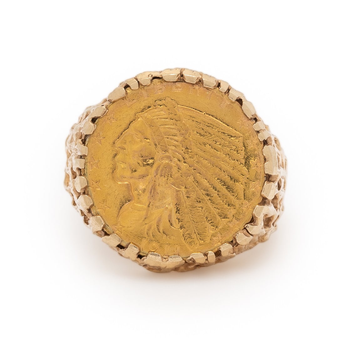 Yellow Gold Coin Ring: Yellow Gold Coin Ring United States Indian Head gold coin measuring approximately 16.75 mm. High-karat yellow gold coin and 14 karat yellow gold. Ring size 7 3/4. Stamp: (maker's mark) 14K. Gross weig