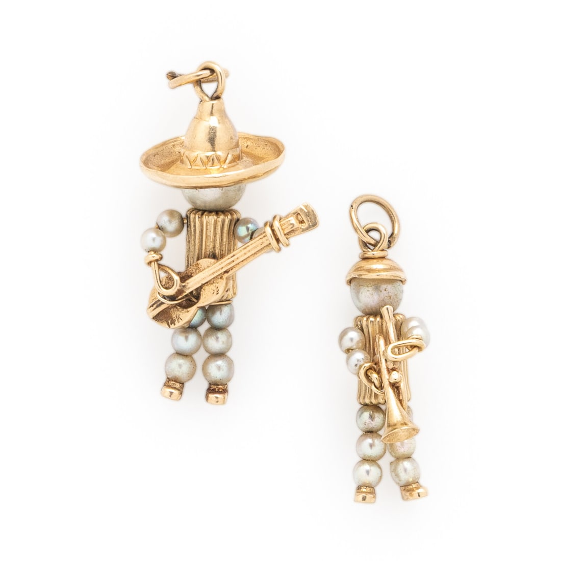 Two Seed Pearl and Yellow Gold Musician Charms: Two Seed Pearl and Yellow Gold Musician Charms Including two figures set with seed pearls. 14 karat yellow gold. 1 1/4 inches long, 1 1/2 inches long. Stamp: 14K (maker's mark). Stamp: 14K (partially