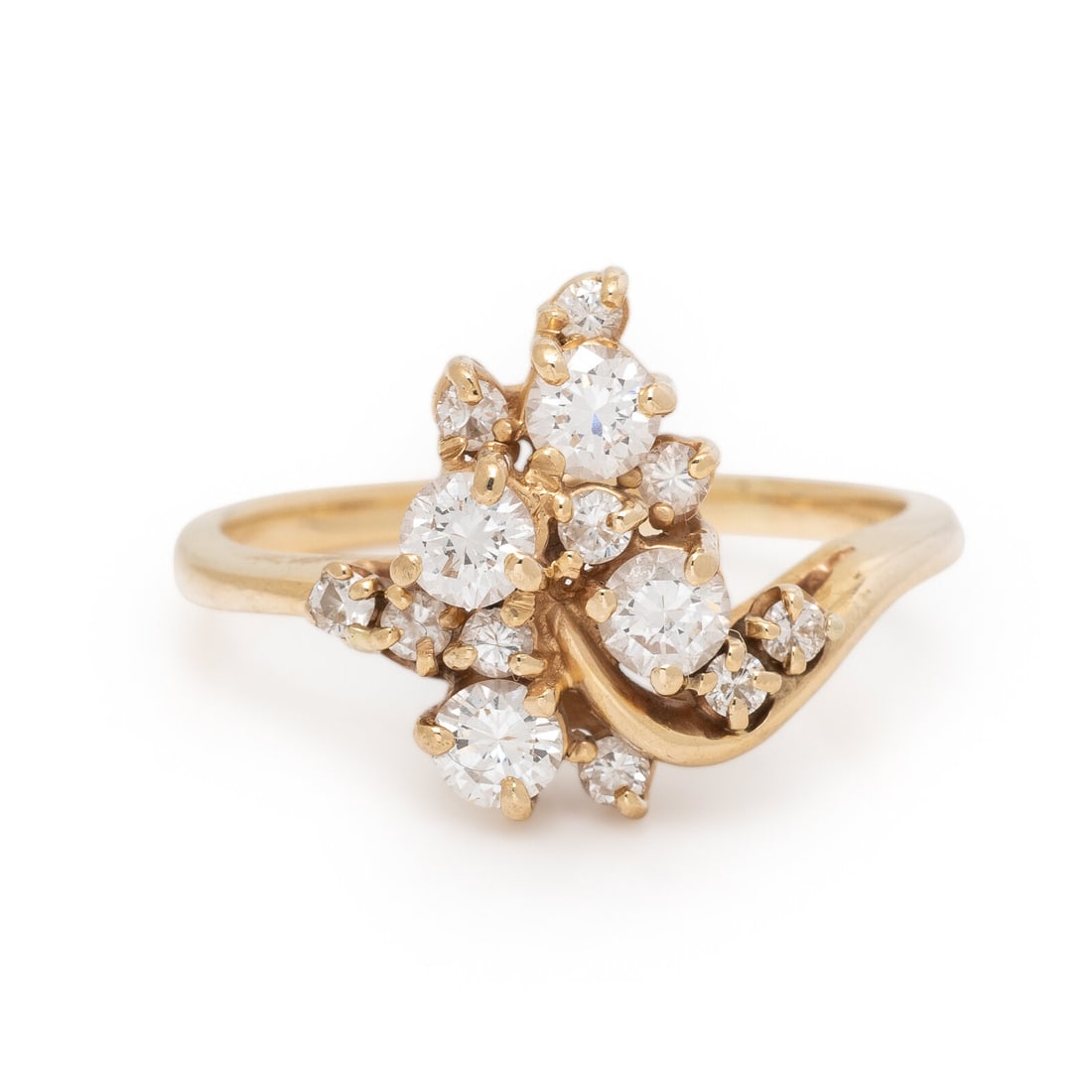 Diamond and Yellow Gold Foliate Ring: Diamond and Yellow Gold Foliate Ring Round diamonds weighing approximately 1.10 carats total. Yellow gold. Ring size 9. Stamp: (partially obscured). Gross weight: 2.60 dwt. Property from a Private