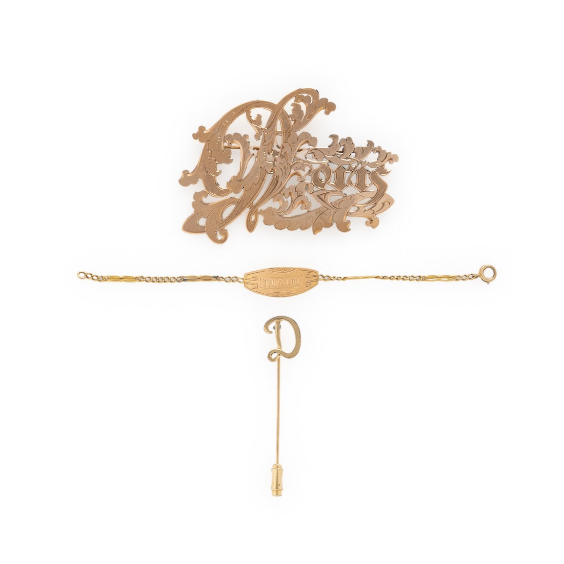 Collection of Yellow and Rose Gold Jewelry: Collection of Yellow and Rose Gold Jewelry Including a 'Doris' brooch, a 'D' stick pin, and a 'DORISELIDA' bracelet. Yellow and rose gold, 14 karat yellow gold, and low karat yellow gold. Brooch: 2