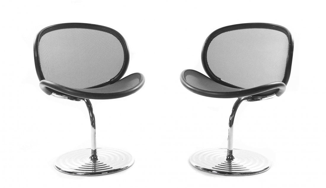 A Pair of German Chromed Aluminum O-Linie Chairs,: A Pair of German Chromed Aluminum O-Linie Chairs, Herbert Ohl (1926-2012), each with a circular mesh back and seat, over a tubular standard raised on a circular base, one with an original label to bas