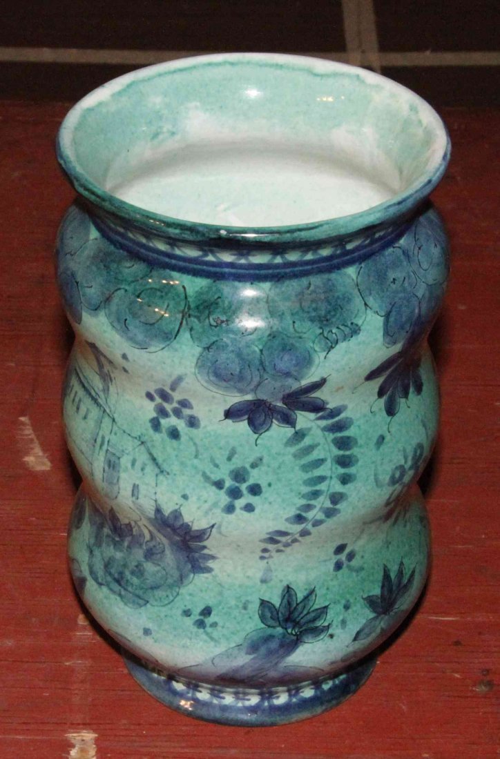 An Italian Faience Jar, Height 8 3/8 inches.: An Italian Faience Jar, of waisted cylindrical form, decorated with a villa amidst foliate decoration. Height 8 3/8 inches. Property from the Estate of Dr. Ivan Jeanne Weiler, Urbana, Illinois