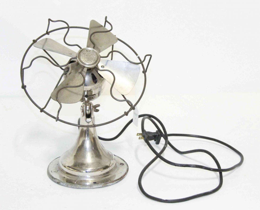 An American Chromed Rotary Fan, Sears Roebuck and Co.,: An American Chromed Rotary Fan, Sears Roebuck and Co., Cold Wave, having an adjustable head, raised on a flared circular base. Height 12 1/4 inches. Property from the Collection of John Robert Wiltgen