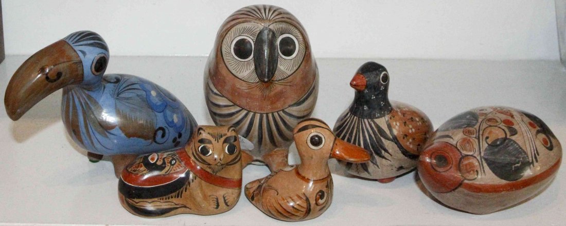 A Collection of Six Mexican Pottery Animals, Length of: A Collection of Six Mexican Pottery Animals, comprising a turtle, an owl, a toucan, a cat, a duck and a song bird. Length of longest 8 inches. Property from the Estate of Dr. Ivan Jeanne Weiler, Urban