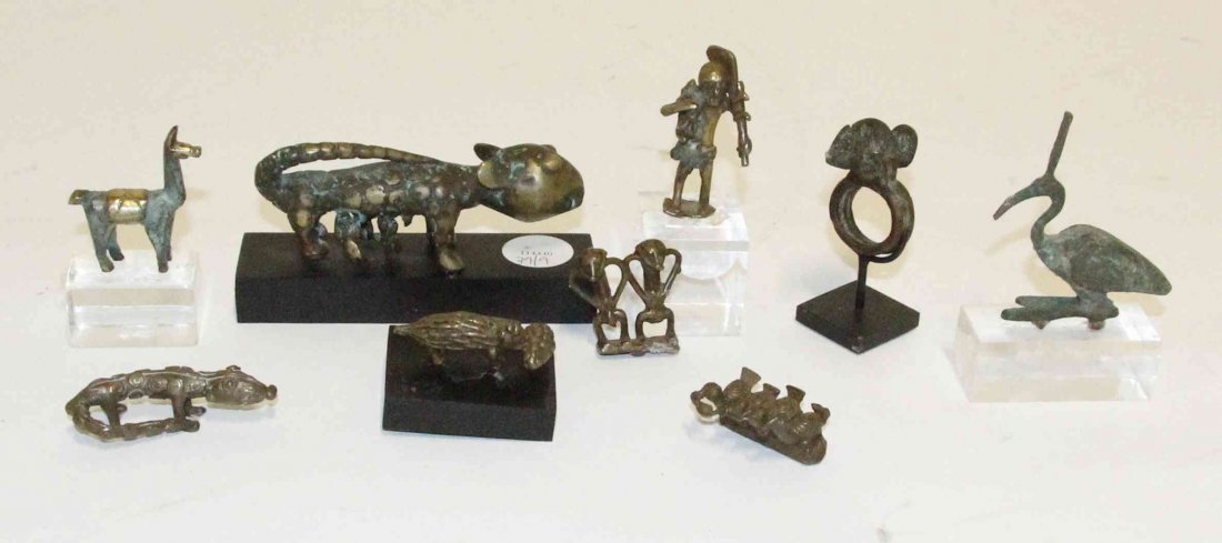 A Collection of African Bronze Decorative Articles,: A Collection of African Bronze Decorative Articles, comprising various animals and birds, together with a ring; nine items total. Length of longest 5 inches. Property from the Estate of Jeanne Marient