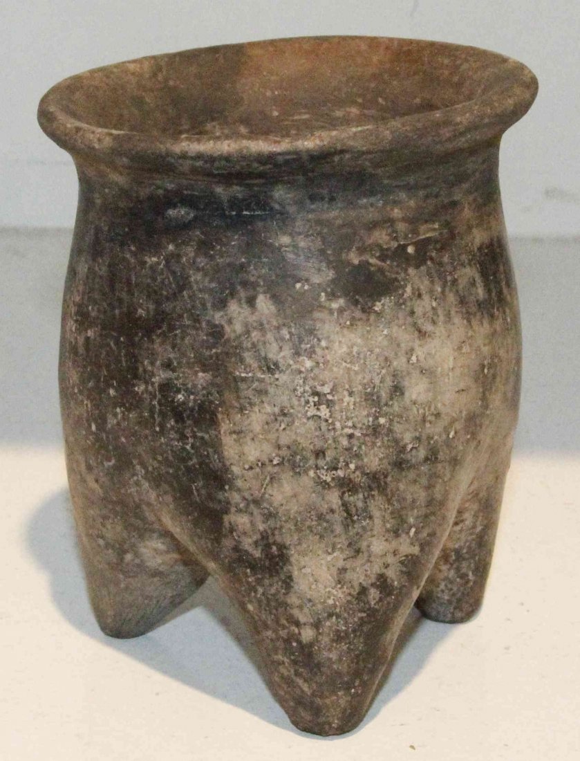 A Chinese Monolithic Tripod Vessel, Height 4 1/2: A Chinese Monolithic Tripod Vessel, having a flared lip. Height 4 1/2 inches. Property from the Estate of Dr. Ivan Jeanne Weiler, Urbana, Illinois