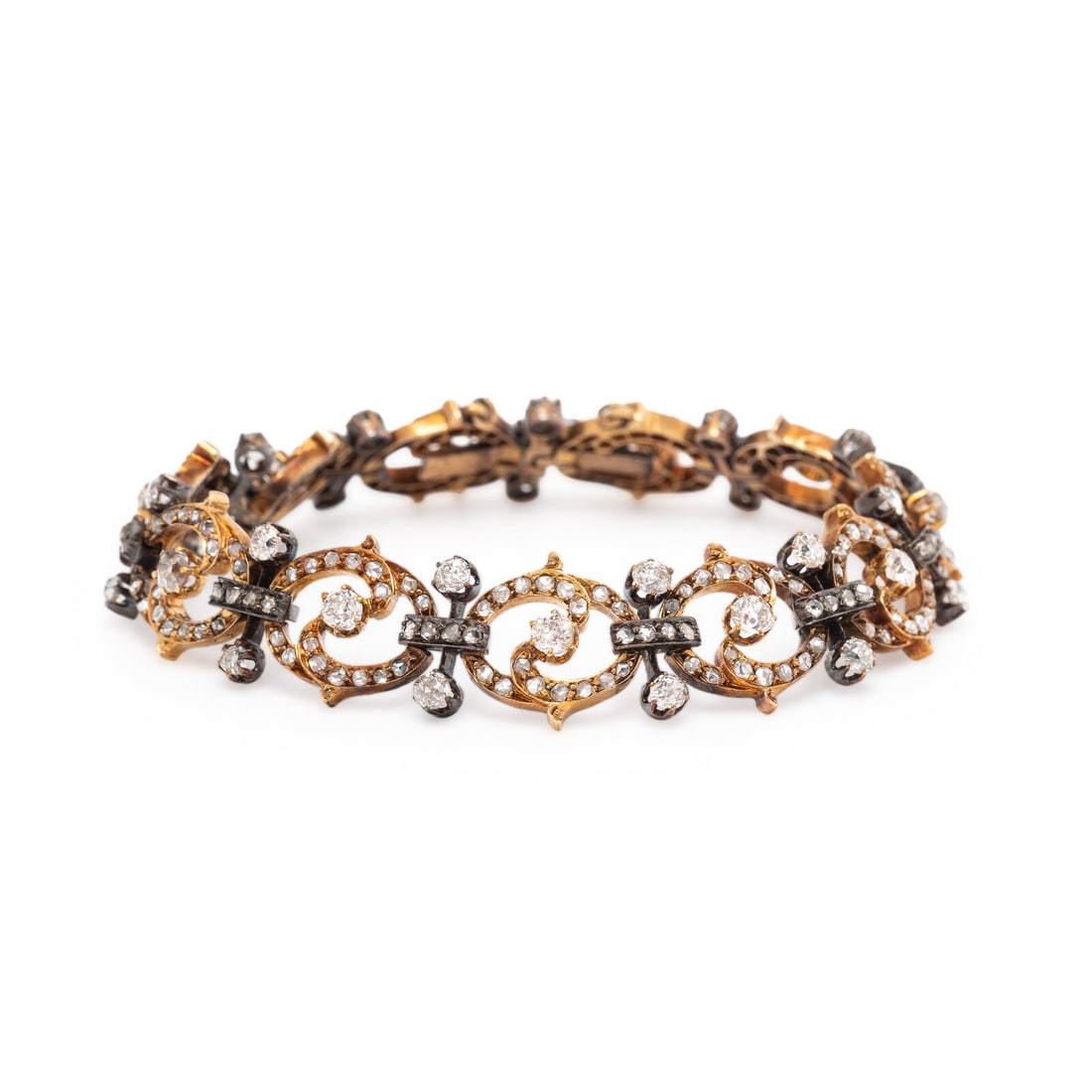 Antique, French, Diamond, Yellow Gold, and Silver-Topped Gold Bracelet: Antique, French, Diamond, Yellow Gold, and Silver-Topped Gold Bracelet Featuring old European cut diamonds weighing approximately 3.55 carats total with rose cut diamond accents. Mounted in 18 karat y