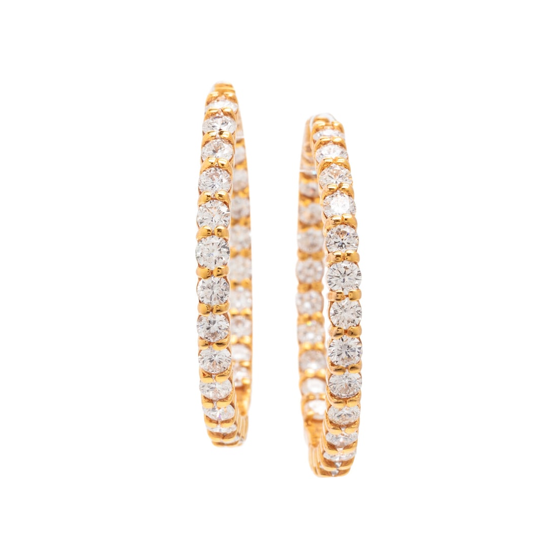 Roberto Coin, Diamond and Yellow Gold Inside Out Hoop Earrings: Roberto Coin, Diamond and Yellow Gold Inside Out Hoop Earrings Set with round brilliant cut diamonds weighing approximately 5.60 carats total. Mounted in 18 karat yellow gold. 1 3/8 inches long. Stamp