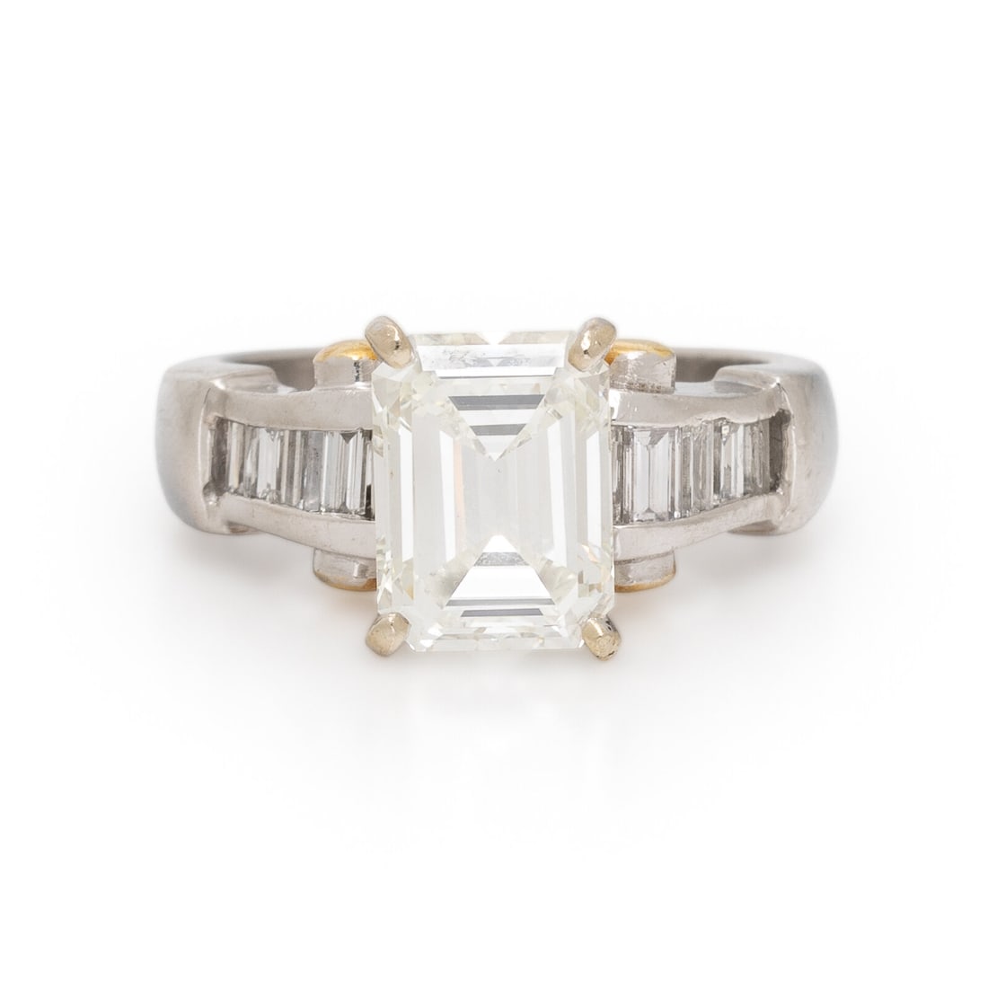 JB Star, Diamond and Platinum Ring: JB Star, Diamond and Platinum Ring Featuring an emerald cut diamond weighing 2.41 carats, the shoulders channel-set with graduating baguette cut diamonds weighing approximately 0.45 carat total. Mount