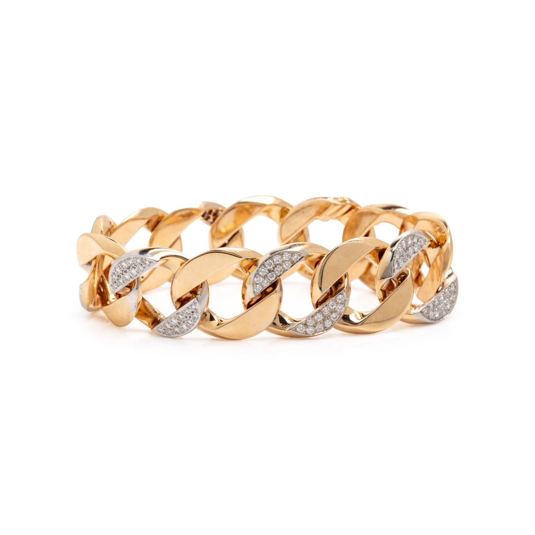 Diamond and Gold Curb Link Bracelet: Diamond and Gold Curb Link Bracelet Flat curb links set with round brilliant cut diamonds weighing approximately 3.85 carats total. Mounted in 14 karat yellow and white gold. 7 7/8 inches long. Stamp: