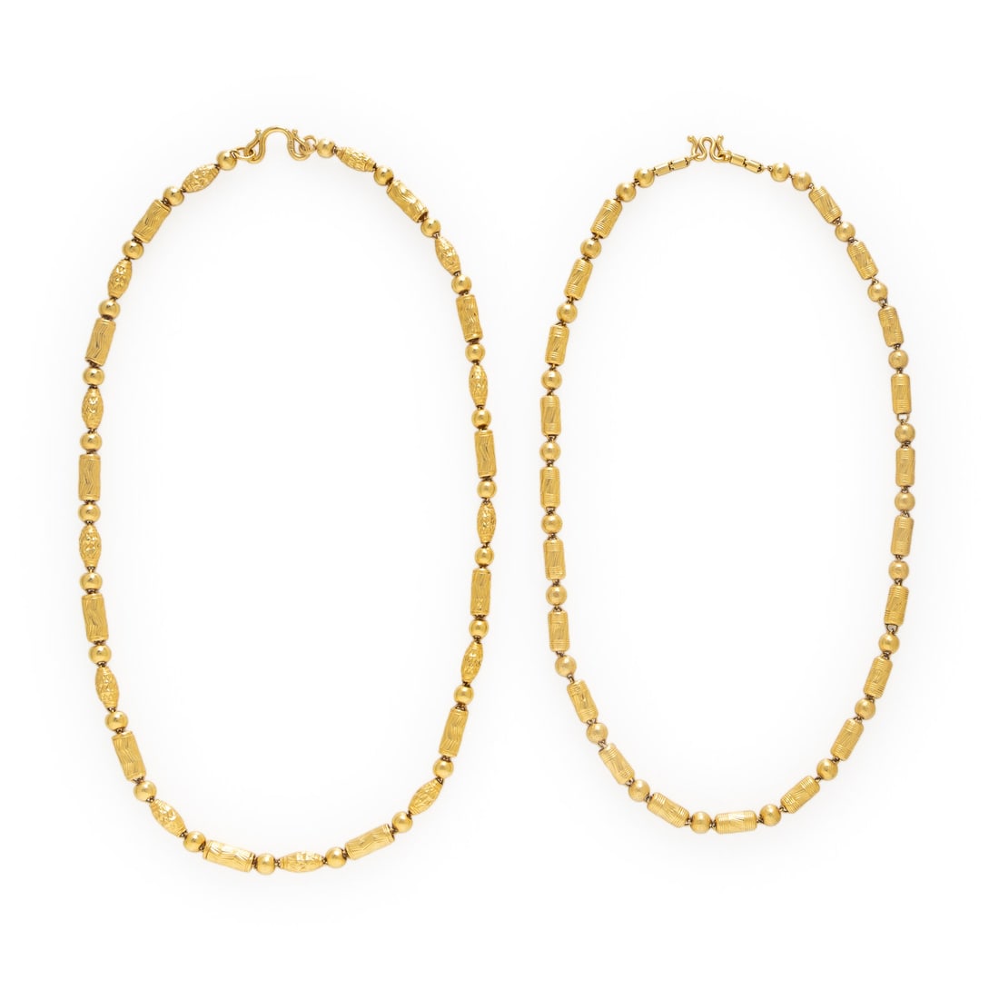 Two High Karat Yellow Gold Fancy Link Necklaces: Two High Karat Yellow Gold Fancy Link Necklaces Featuring alternating round and tubular textured beads. High karat yellow gold. 25 inches long, and 26 inches long. Gross weight: 96.65 dwt. Property fr