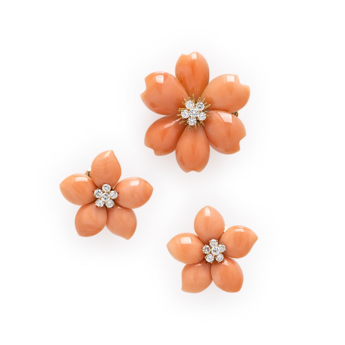 Van Cleef & Arpels, 'Rose de Noël', Coral and Diamond Brooch and Earrings: Van Cleef & Arpels, 'Rose de Noël', Coral and Diamond Brooch and Earrings Including a pair of earrings and a brooch in a floral design, set with carved coral petals and round brilliant cut diamon
