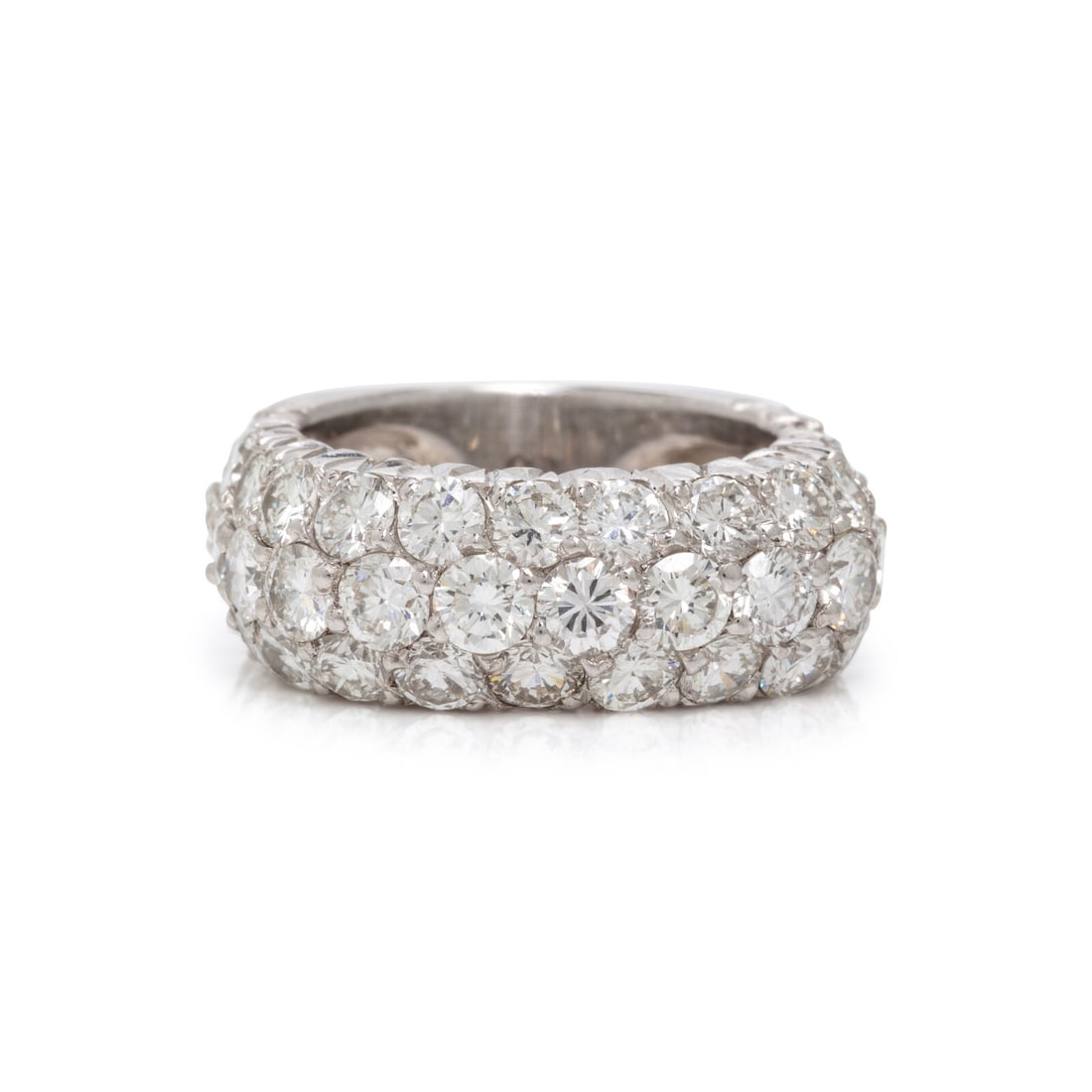Diamond and Platinum Ring: Diamond and Platinum Ring Designed with three rows of round brilliant cut diamonds weighing approximately 5.65 carats total. Mounted in platinum. Ring size 4 3/4. Stamp: 9. Gross weight: 8.80 dwt. Pro