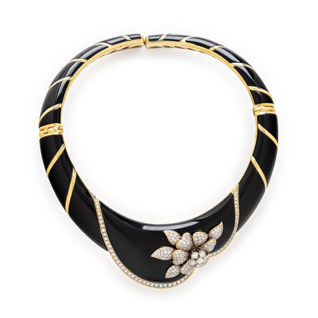Onyx, Diamond, and Yellow Gold Collar Necklace: Onyx, Diamond, and Yellow Gold Collar Necklace Contoured to the collar, set with carved black onyx accented by a floral motif with an 'en tremblant' center element set with round brilliant cut diamond