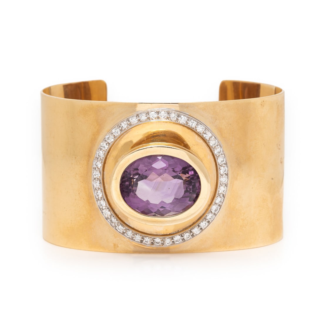 M&J Savitt, Amethyst, Diamond and Yellow Gold Cuff Bracelet: M&J Savitt, Amethyst, Diamond and Yellow Gold Cuff Bracelet Featuring an oval amethyst weighing approximately 16.00 - 18.00 carats by formula, circled by round brilliant cut diamonds weighing approxim