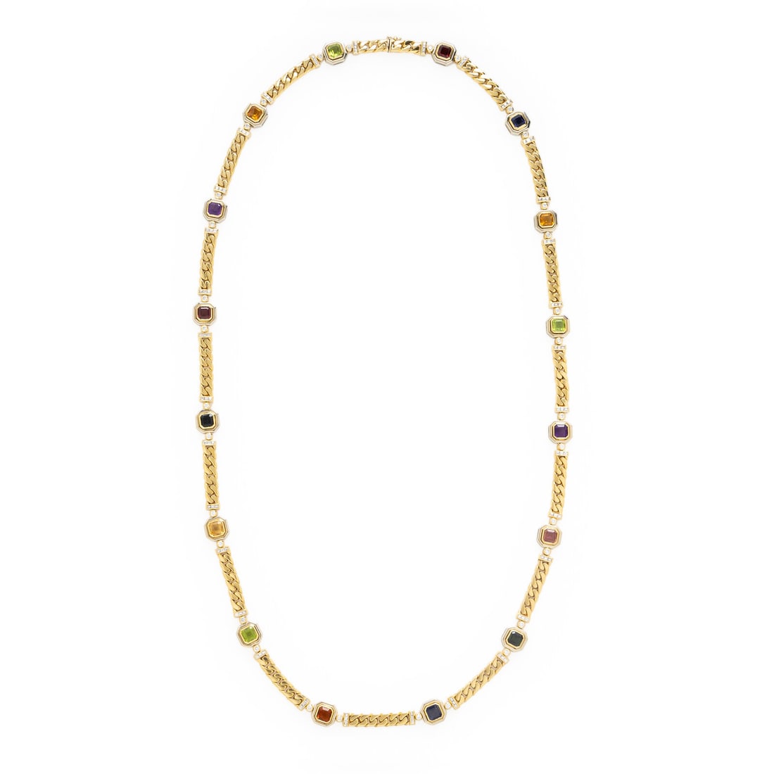Multigem, Diamond, and Yellow Gold Chain Necklace: Multigem, Diamond, and Yellow Gold Chain Necklace On a curb chain, set with numerous stations of Asscher cut gemstones including peridot, pink and green tourmaline, amethyst, citrine, garnet, and ioli