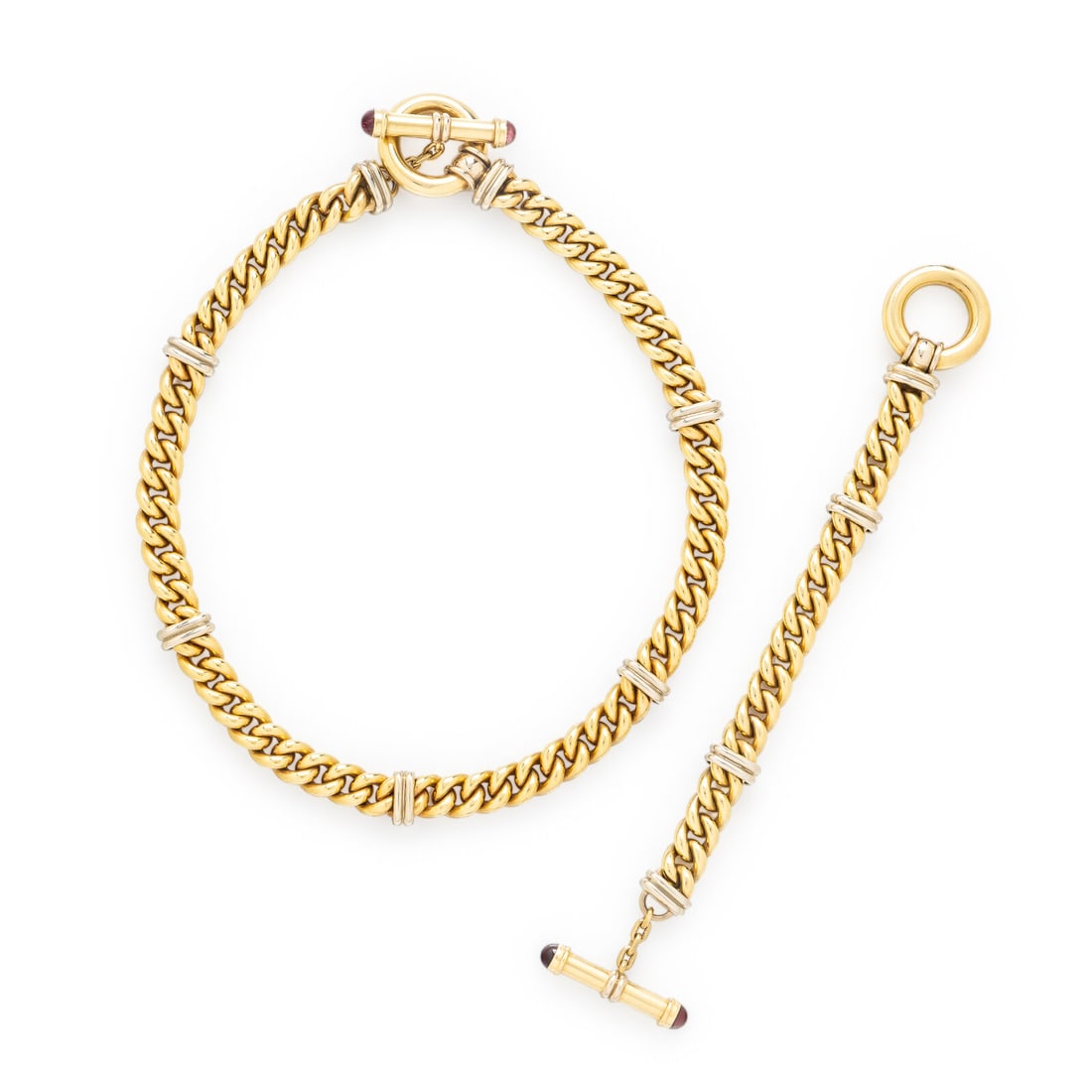 Signoretti, Yellow Gold Toggle Chain Necklace and Bracelet: Signoretti, Yellow Gold Toggle Chain Necklace and Bracelet Including a curb link necklace and bracelet, both with round cabochon pink tourmaline terminals and toggle closures. Mounted in 18 karat yell