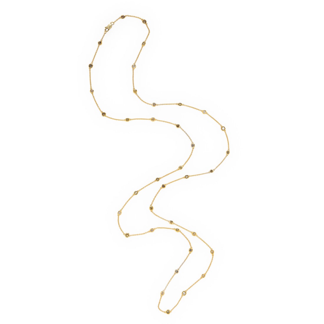 Hubert, Diamond, Colored Diamond, and Yellow Gold Station Necklace: Hubert, Diamond, Colored Diamond, and Yellow Gold Station Necklace Featuring variously shaped diamonds, and yellow and brown diamonds (origin of color not tested) weighing approximately 5.23 carats to