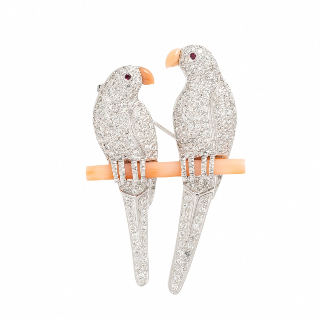 Diamond, Coral, and White Gold Lovebirds Brooch: Diamond, Coral, and White Gold Lovebirds Brooch Designed as a pair of lovebirds perched on a carved coral branch, pavé-set with round brilliant cut diamonds weighing approximately 2.80 carats tot